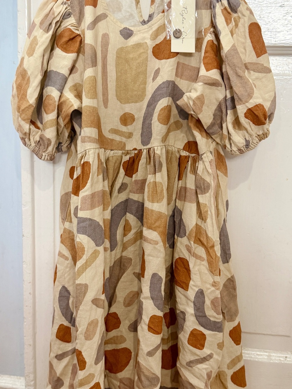 Rylee + Cru Beige Dress with Rust, Tan and Gray Abstract Print